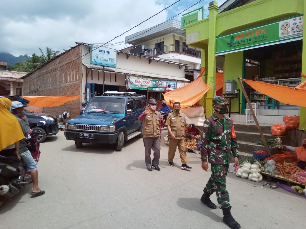 Pertegas Peraturan Bupati, Tim Gugus Tugas Covid- 19 Datangi Pasar Sudu