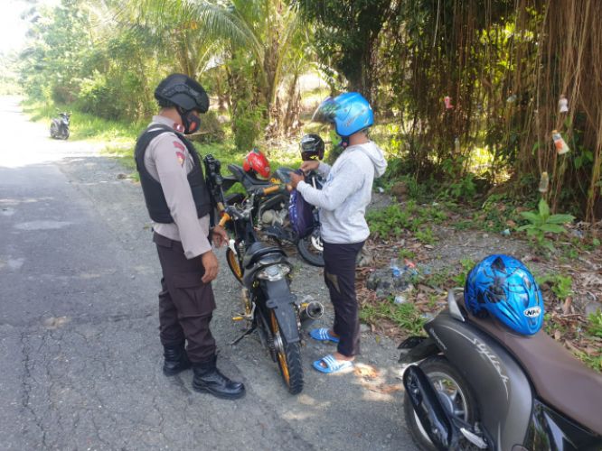 Razia Kendaraan di Bunta, Polisi Temukan Miras dan Sajam