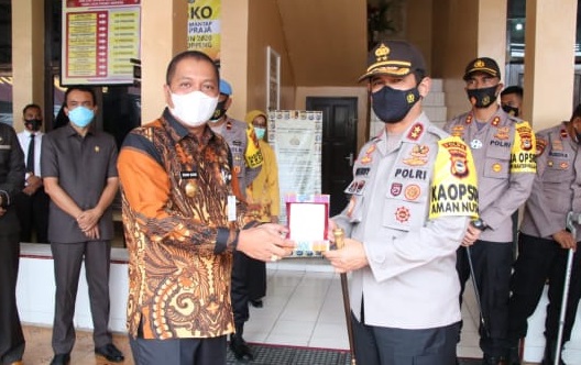 Pjs Bupati Sampaikan Perkembangan Pilkada dan Covid ke Kapolda Sulsel