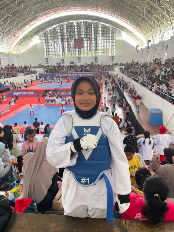 Putri Jurnalis Ratu Nurhilma Thalita Raih Medali Emas Ketiga di Open Turnamen Taekwondo Unhas 2024