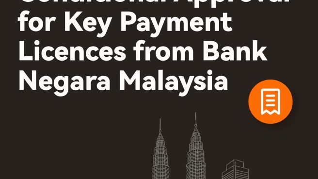 Logo XTransfer dan pengumuman persetujuan lisensi pembayaran dari Bank Negara Malaysia (BNM).