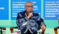 Wakil Menteri Ketenagakerjaan Afriansyah Noor saat memaparkan tantangan digitalisasi dan AI dalam Indonesia Cloud and Datacenter Convention 2026.